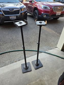 Surround sound adjustable metal speaker stand.