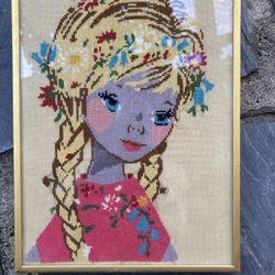 Vintage needlepoint girl with braids