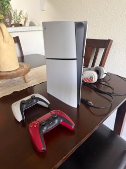 PlayStation 5 Slim Console with Two Controllers