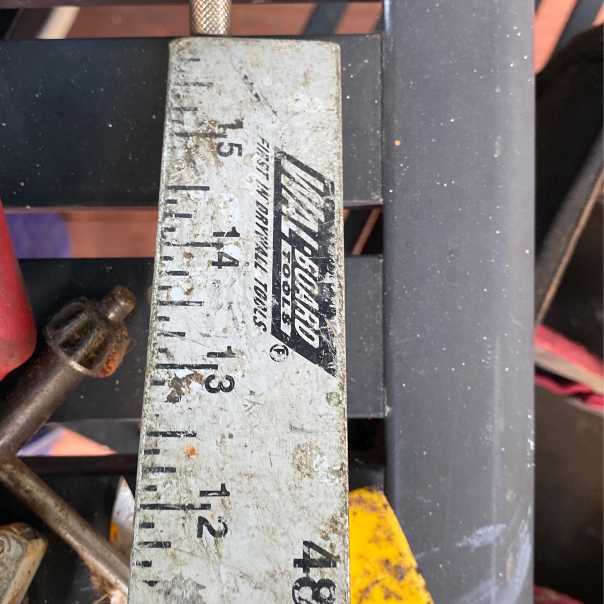 4 foot aluminum drywall T-square used by wallboard tools