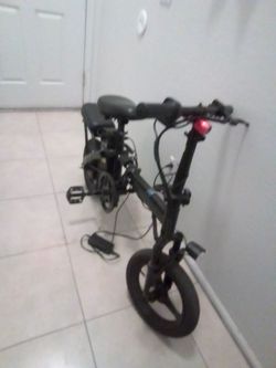 Foldible 14' ebike 25 mph