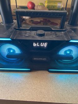 Karaoke machine/ Bluetooth speaker. No manual