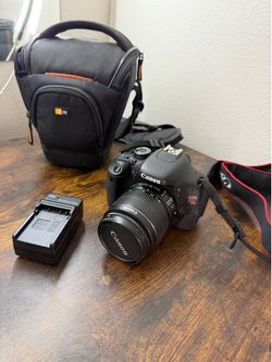 Canon EOS Rebel T3i DSLR + 18–55mm Lens, Charger & Case