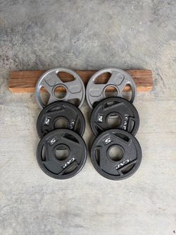 Cap Olympic Barbell Grip Weight Plates $35