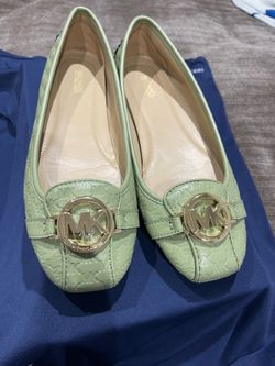 Women’s light mint green Michael Kors slip ons. Size 9M