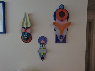Three geometric wall masks