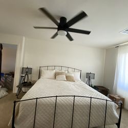  This is a sturdy and stylish black metal king-size bed frame from Living Spaces. 