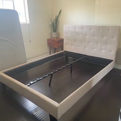 Queen Upholstered Platform Bed, featuring a button-tufted headboard.