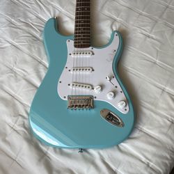Fender Squire strat New still has the plastic on her. With gig bag perfect gift or first guitar great color mint. Who ever buy it can remove the plast