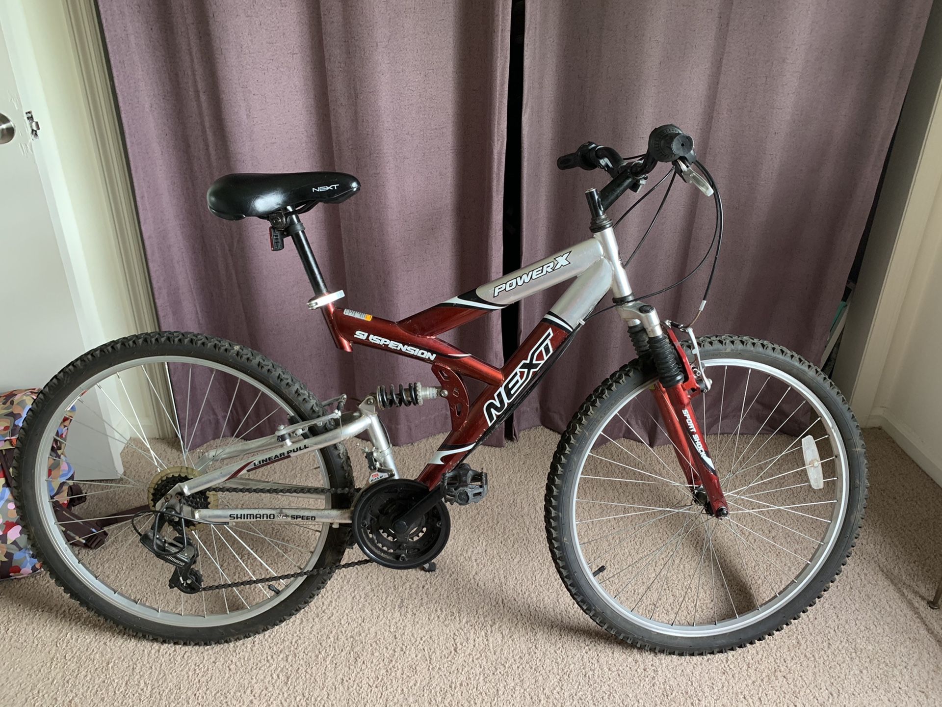 17” frame, 25” tire, mountain bike red/silver