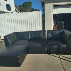 Black Faux Leather Couch ($120)