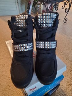 Black High-Top Sneakers with Silver Studs