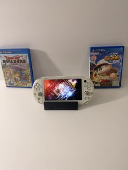 White PS VITA 2000  Comes With 2 Games Very Good Condition