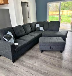 Charcoal linen sectional couch and ottoman