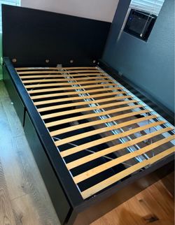 Queen bed with two drawers on the bottom