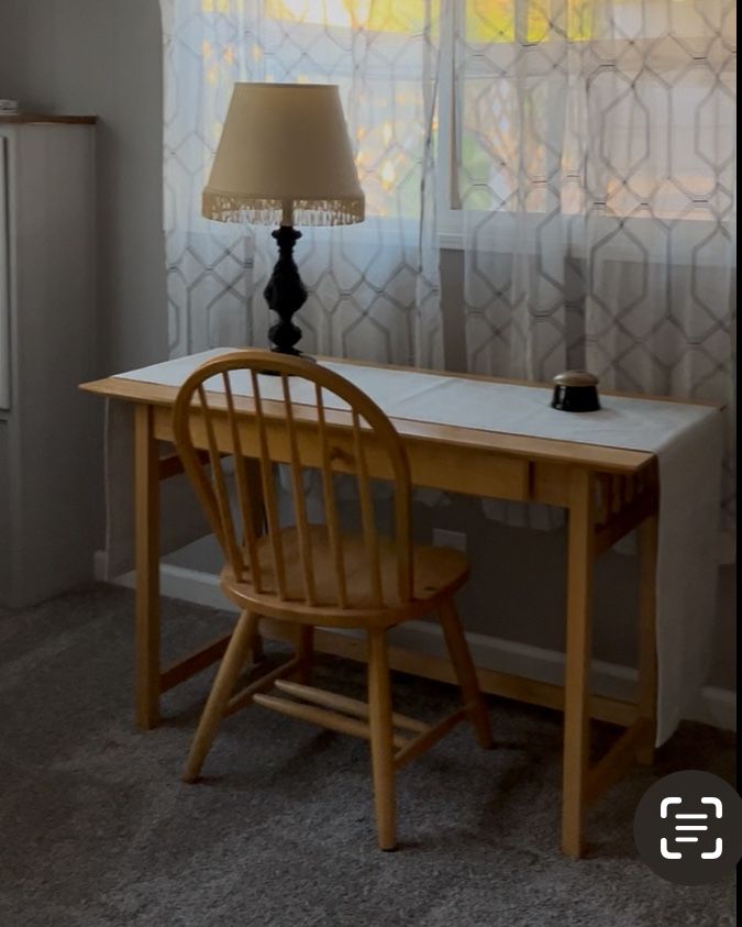Desk and chair, sofa, table, and table, coffee table, large gold mirror, curio cabinet with glass shelves