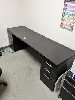 Black Desk Top On 2 Cabinets