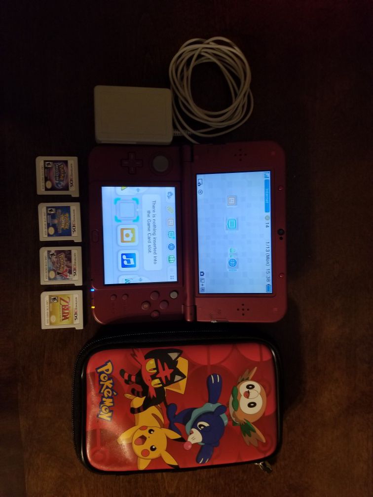 New Nintendo 3DS XL + Case, Charger, 4 Games, Extra Stylus