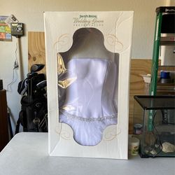 Size 4 Beautiful wedding dress princess style corset top with chiffon bottom cleaned and been in preservation box