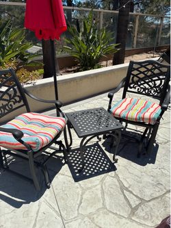 2 Rocker Chairs and a table