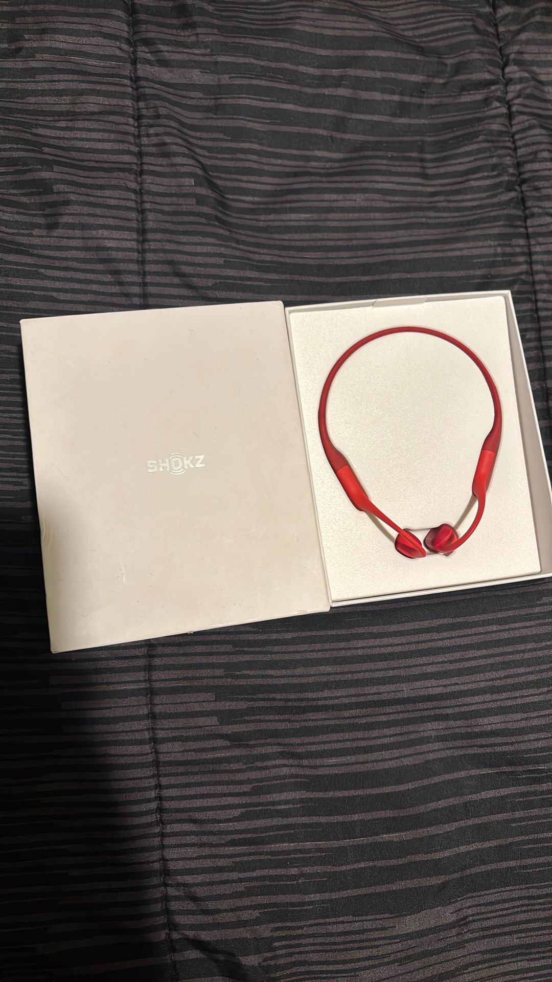 Red open run bone conduction headphones