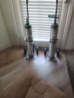 $60 2 TANKS AND CONTROL VALVE WITH ROLLING CART FOR EACH