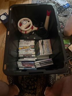 Xbox console with accessories and 32 games.  Also 8 Wii games as well