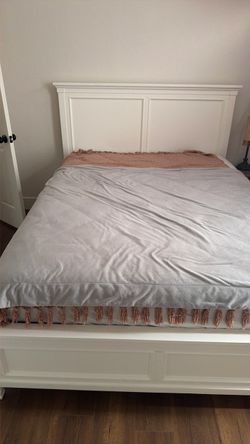 Queen bed , wood , white.