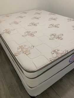 New queen mattress and box spring. 2 pc bed frame is not included