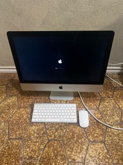 21.5” iMac with wireless keyboard and mouse