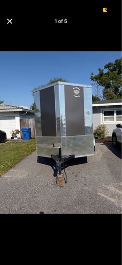 2025 diamond cargo 6x12 enclosed trailer like  brand new.
