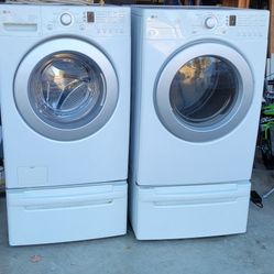 LG Front-load Washer And Dryer W/ Pedestals