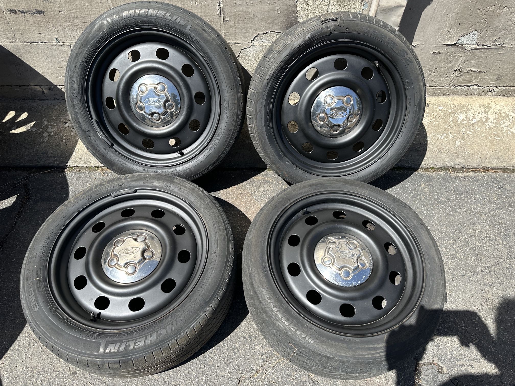 Stock steel 17 inch ford wheels with chrome caps. 5 on 4.5 inches 