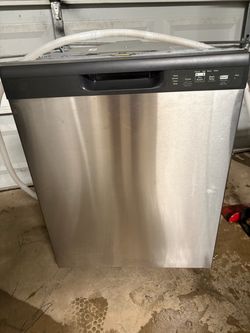 25” inch W Stainless Steel  GE Dishwasher. Works like new . 1 year old