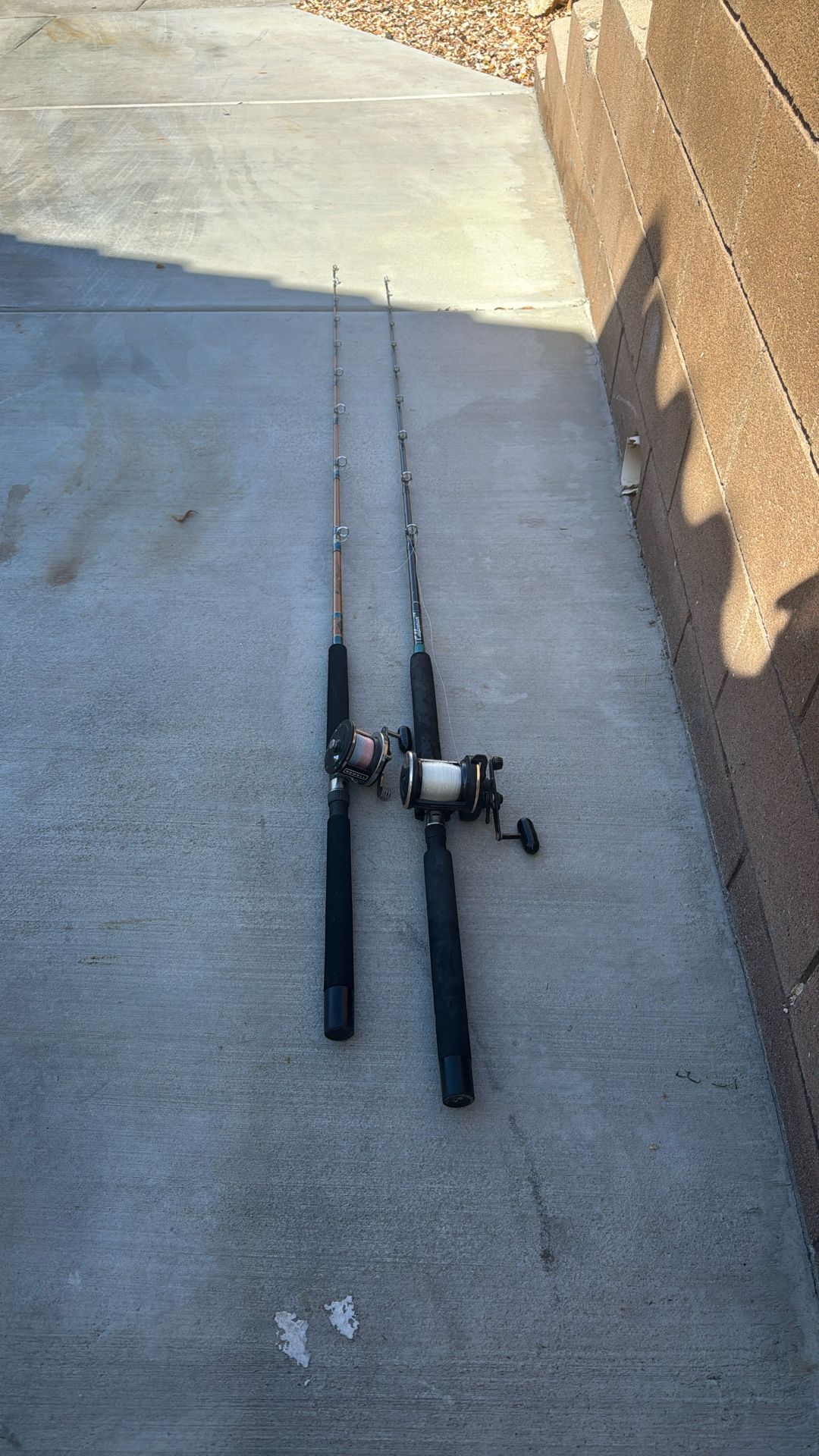 2 fishing rods and reels