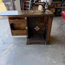 Vintage Franklin Sewing Machine with Cabinet And Attachments.