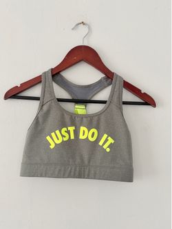 Nike "Just Do It" racerback sports bra in a heather grey color with bright neon yellow dozen like new