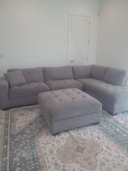 L shaped sectional Sofa and Ottoman included.