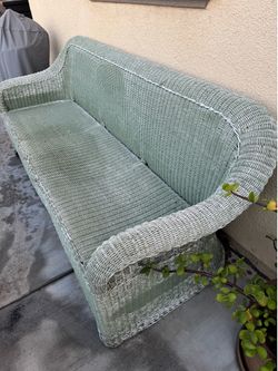Wicker couch and cushions