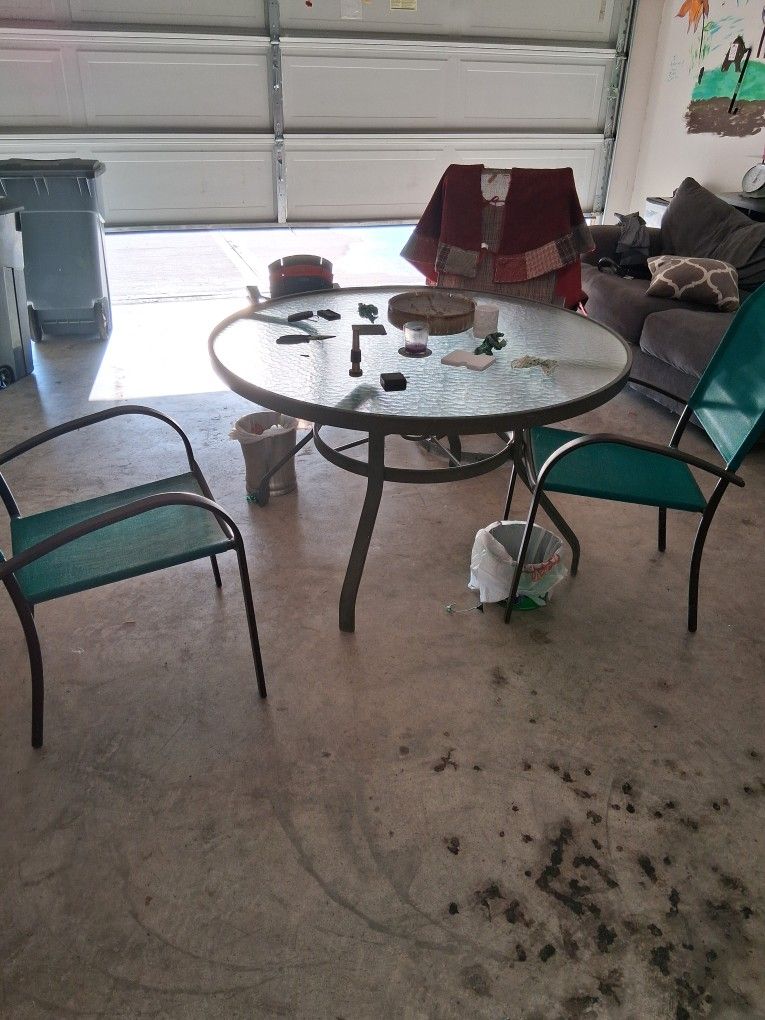 Patio Table Ready To Go With 2 Aqua Used Chairs