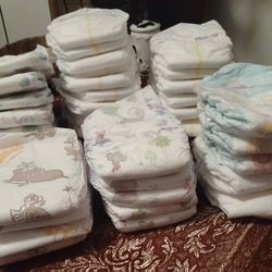 37 Mixed Brands Sz 1 Diapers 
