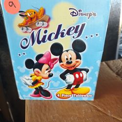 FOUR PIECE TABLE WARE WITH MICKEY AND MINNIE MOUSE