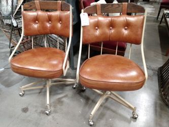 Two leather rolling chairs