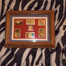 Vintage Stamp Pins In Display