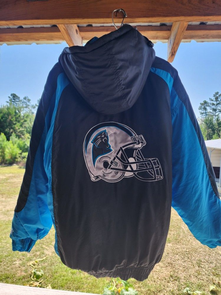 Logo Athletic Pro Line Carolina Panthers NFL Jacket  Hooded Full Zip Size XL . Worn once. Heavy Weighted jacket. The hood zips off. The front had a zi