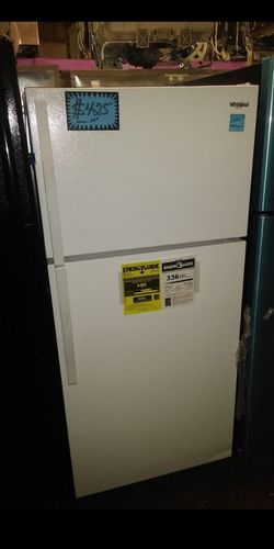 New Whirlpool top and bottom fridge (scratched/dented)