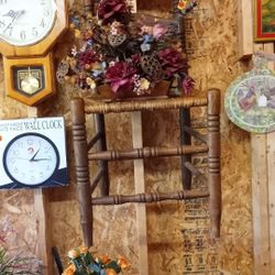 Antique wooden chair with wicker seat