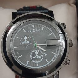 Gucci men's women's watch with a box.