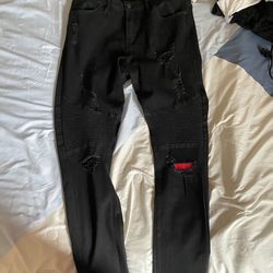 Black And Red Stacked Jeans