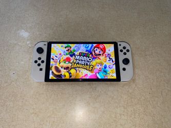 NINTENDO SWITCH OLED MOD + 512GB SD and 7500 GAMES